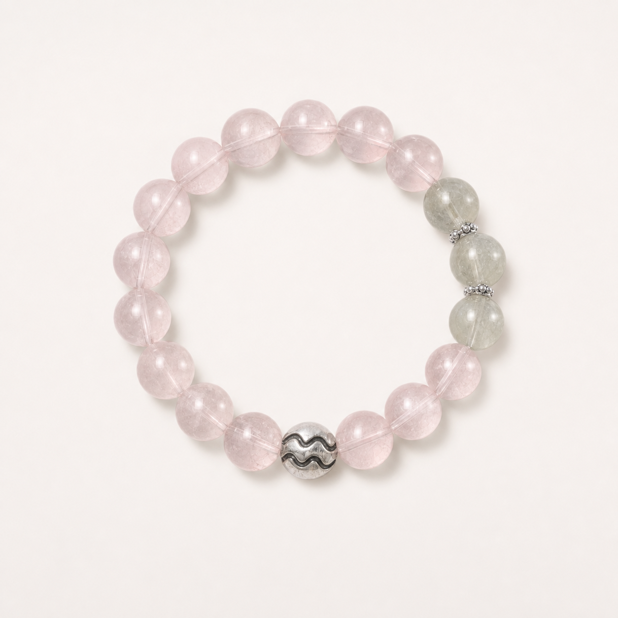 Aquarius crystal bracelet with soft pink Rose Quartz and pale green Prehnite beads in a refined styled setting