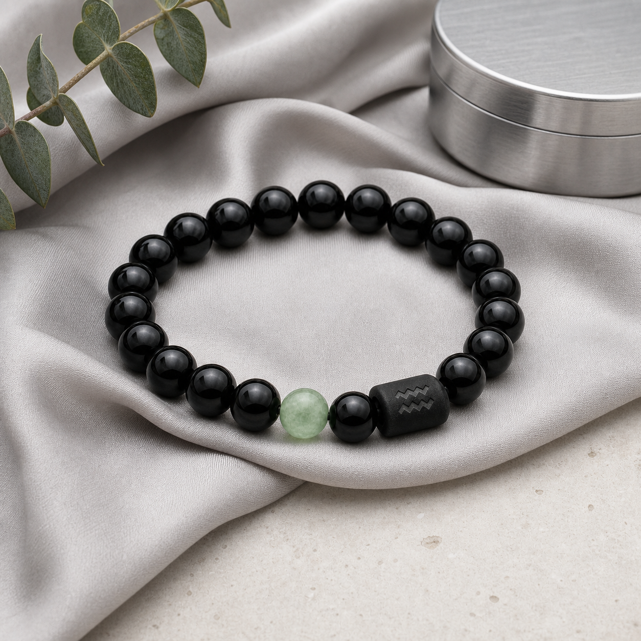 Aquarius zodiac bracelet with black obsidian and Tiger’s Eye beads in a modern styled setting