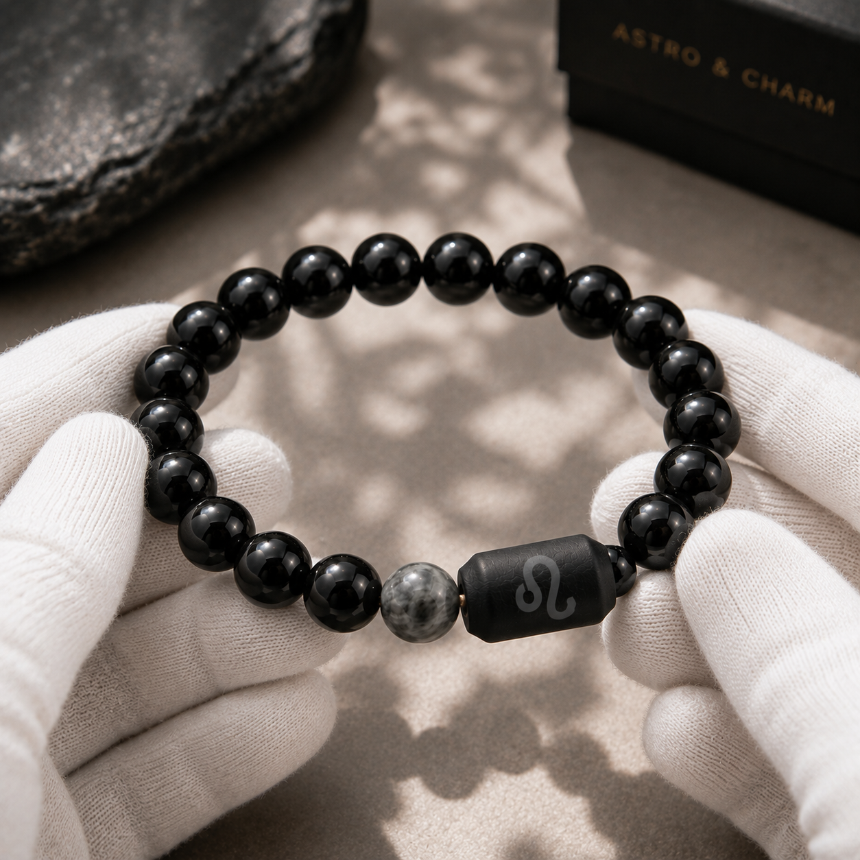 Leo zodiac bracelet being inspected for bead alignment and finish details
