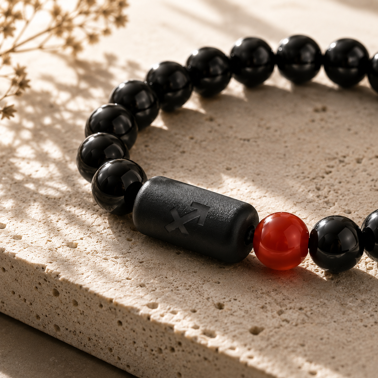 Sagittarius zodiac bracelet with black obsidian and Tiger’s Eye beads in a dark styled setting
