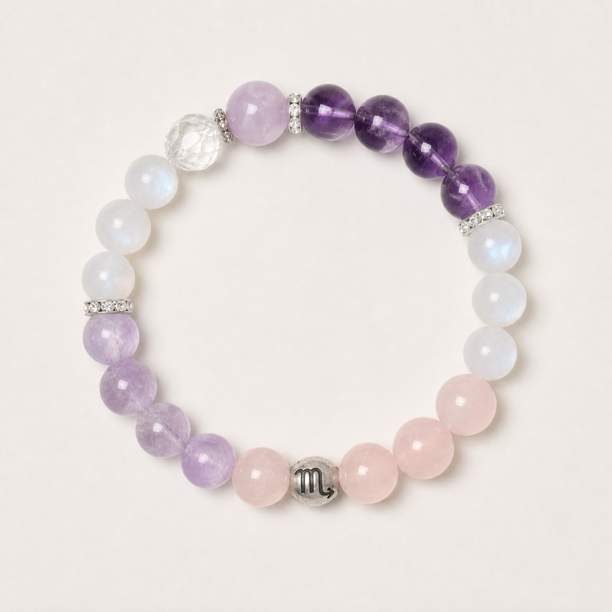 Scorpio crystal bracelet with purple, lavender, pink and luminous white crystal beads in a refined styled setting
