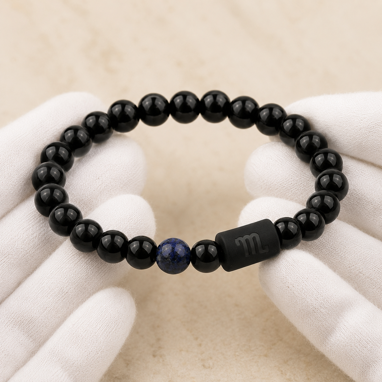 Scorpio zodiac bracelet being inspected for bead alignment and finish details
