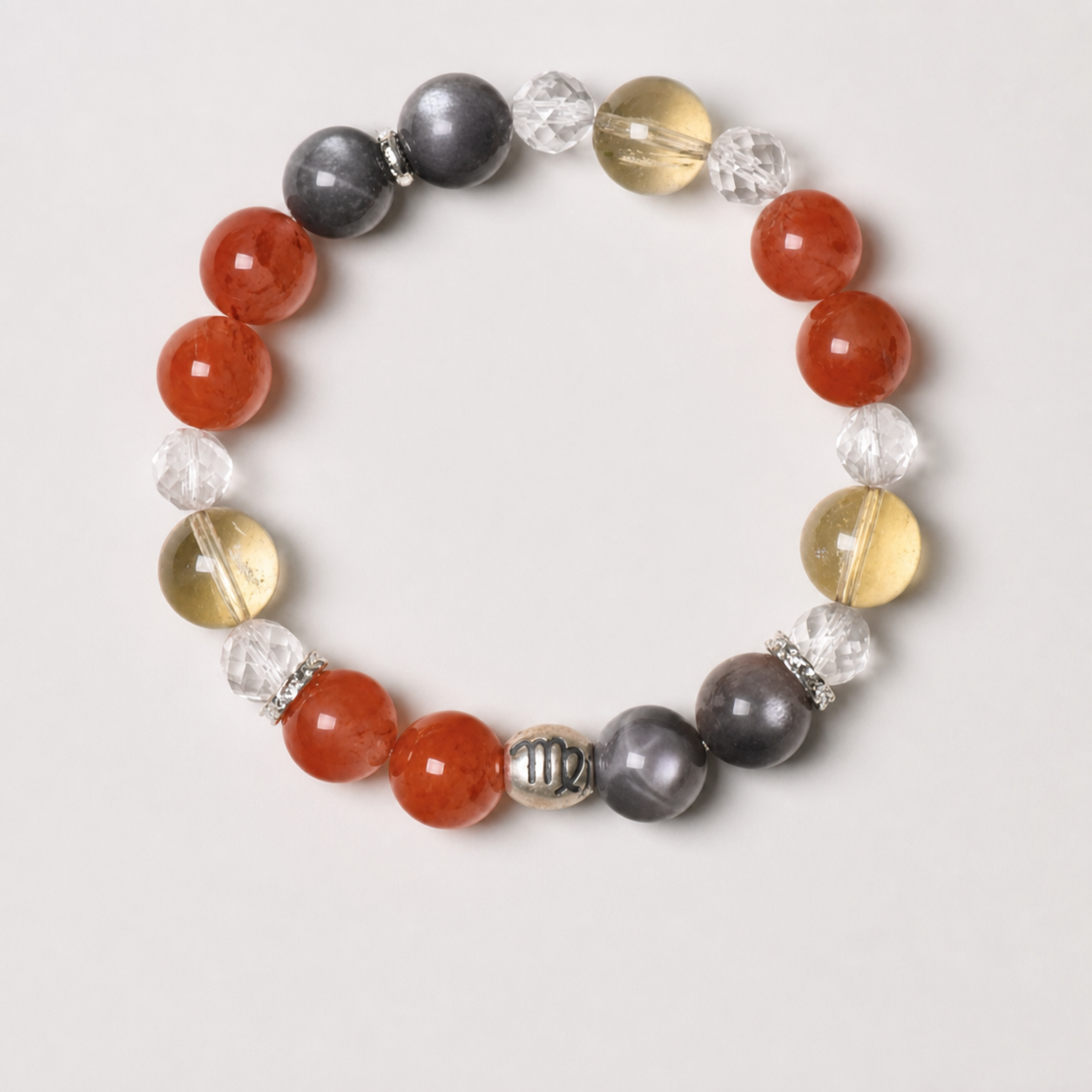 Virgo crystal bracelet with golden, red, dark and clear crystal beads in a refined styled setting