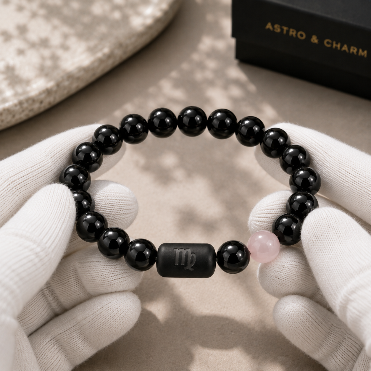 Virgo zodiac bracelet being inspected for bead alignment and finish details
